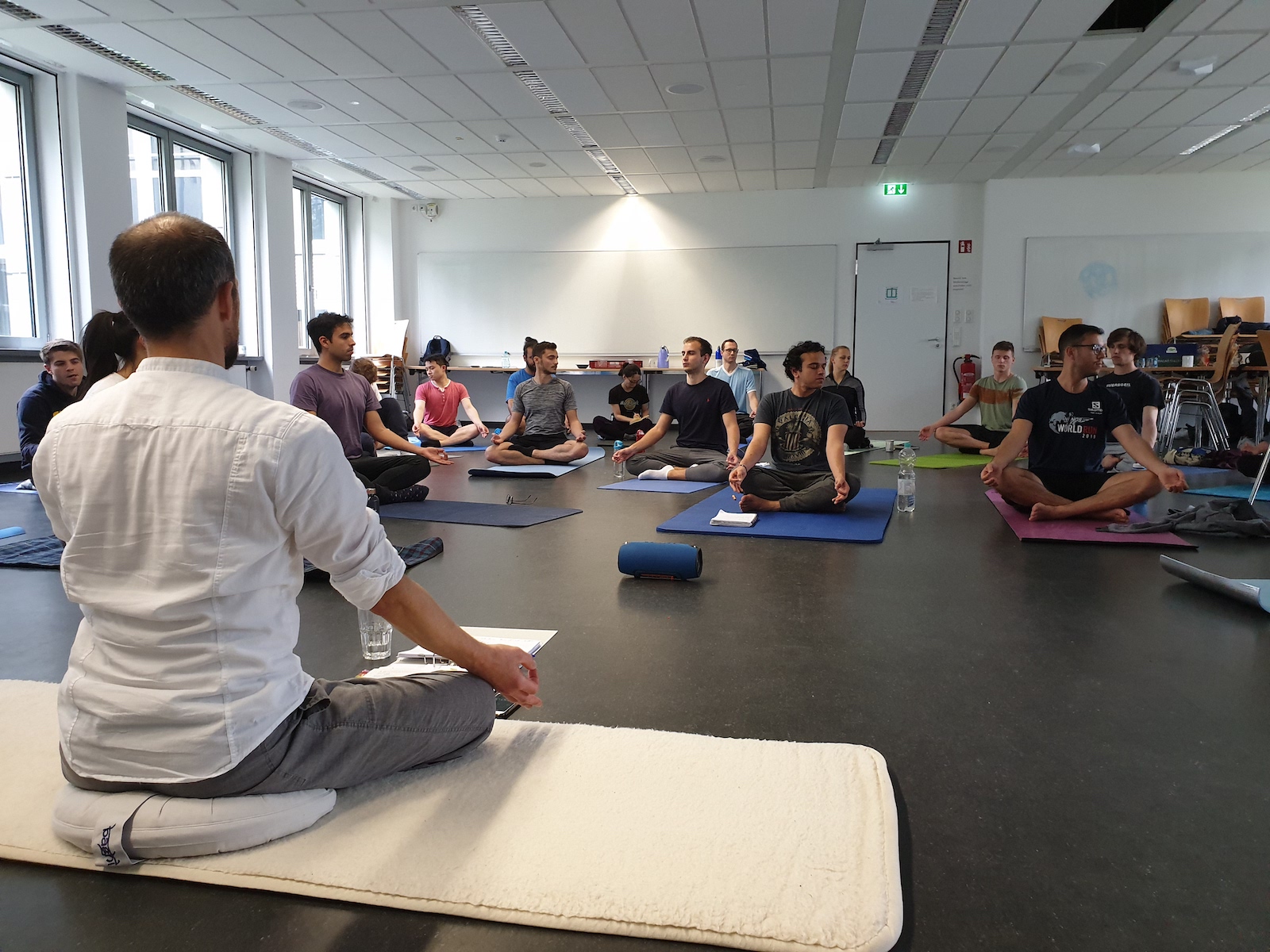 Students and the instructor meditating